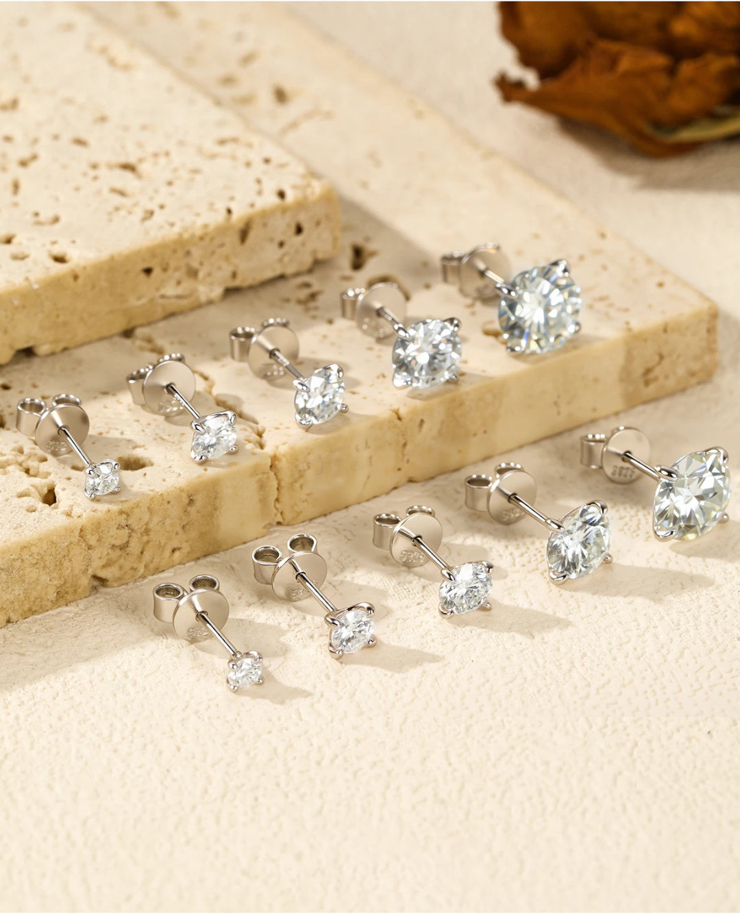 classic round moissanite solitaire studs