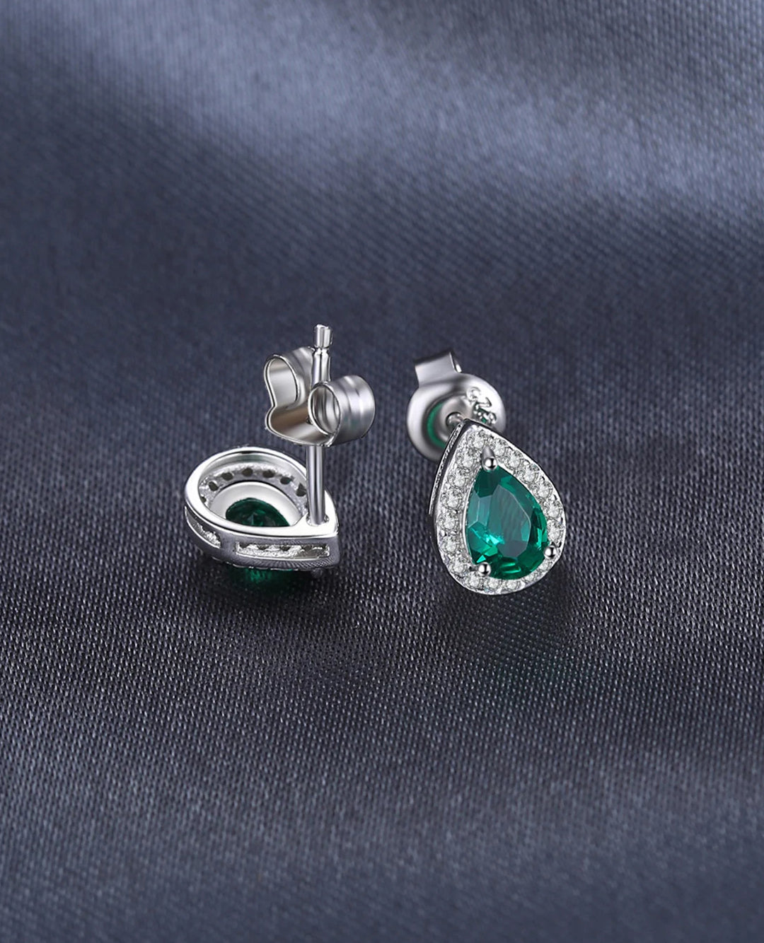 created nano emerald teardrop studs