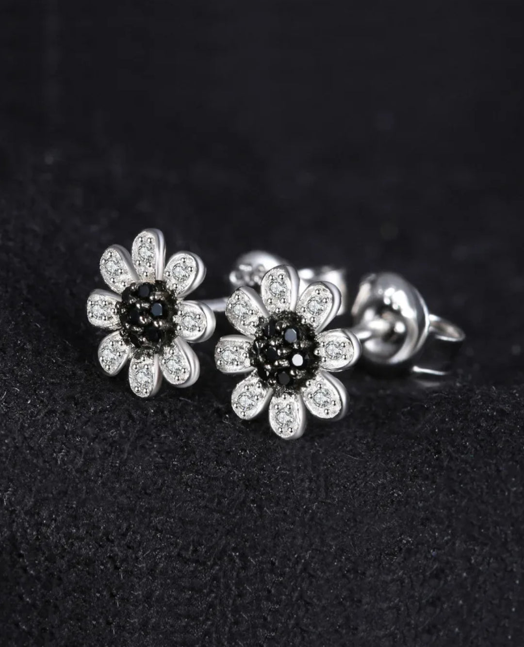 sterling silver floral studs — black spinel