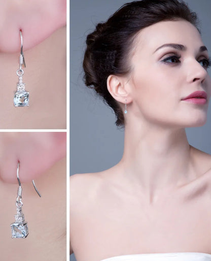 Natural Sky Blue Topaz Hook Earrings in Sterling Silver