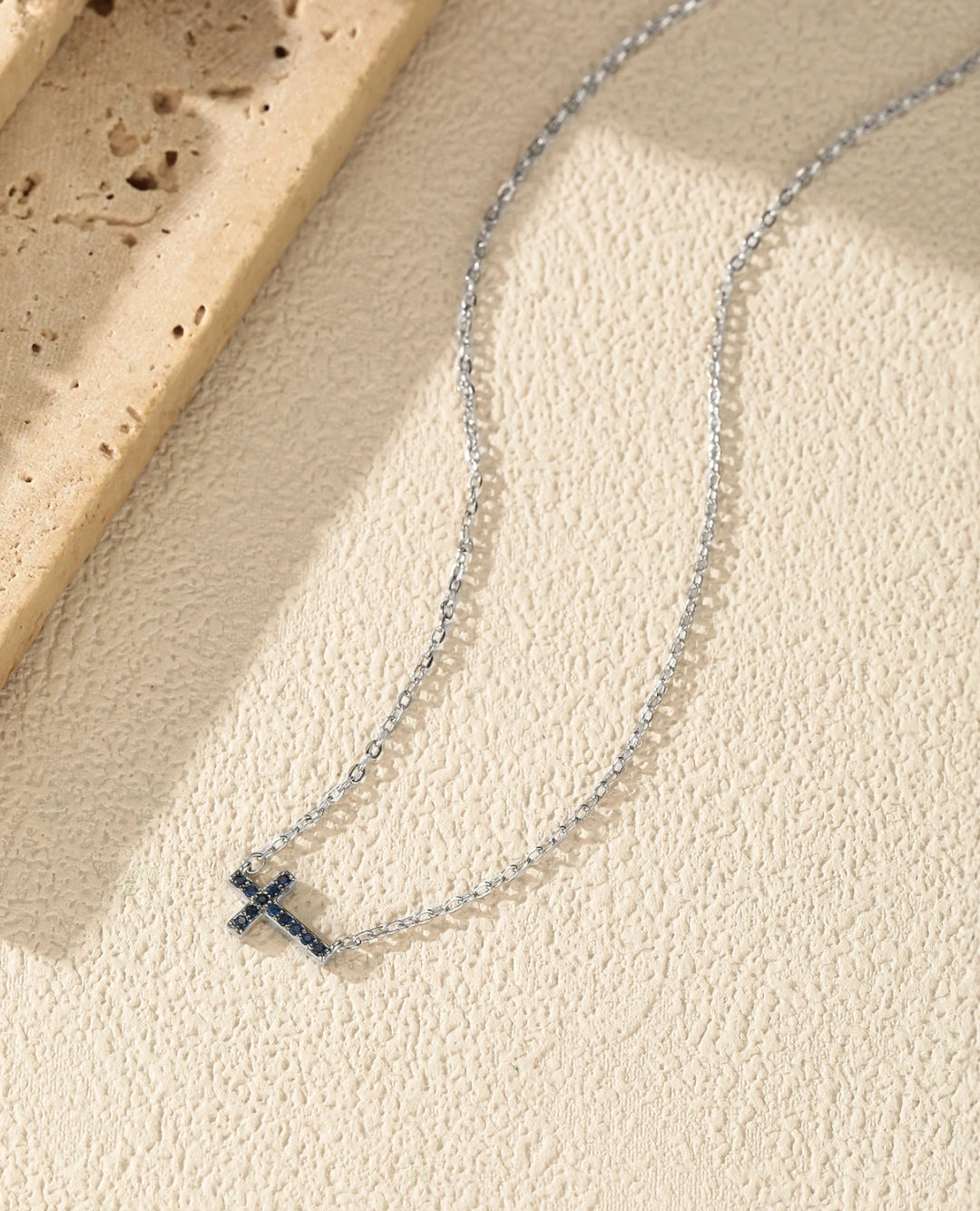 minimal blue cross necklace